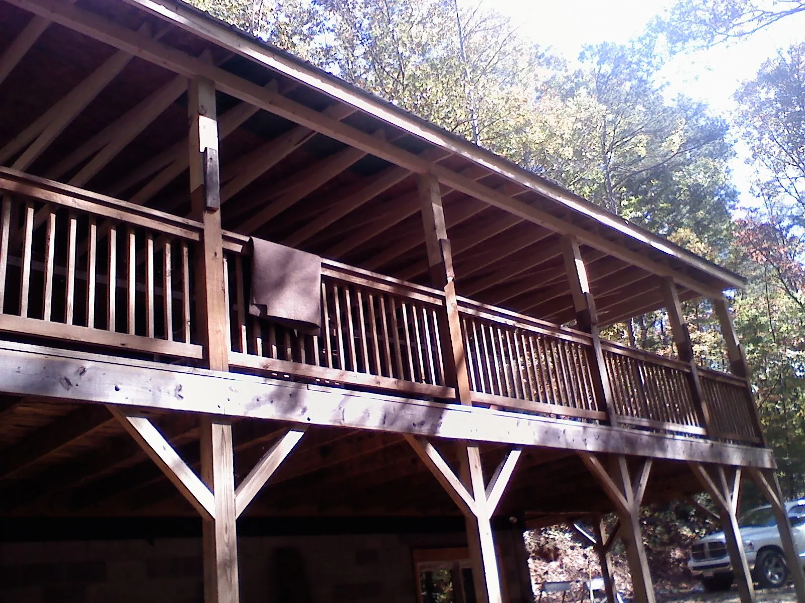 Timber framing under a new elevated porch and deck — Roof Leak Repair in Gilmer by Roofing Brothers